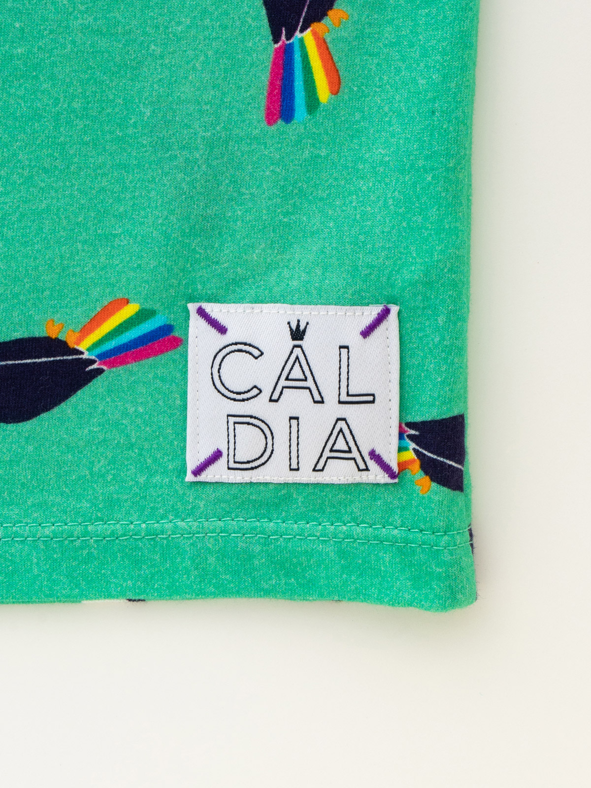 ベビートップス|【ベビー服】【日本製】Caldia(カルディア)レインボーオウム柄Tシャツ