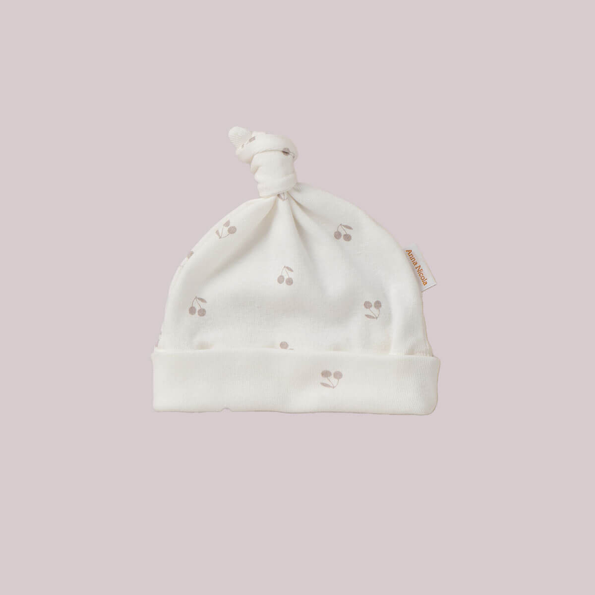 キュッと結んだデザインが愛らしい帽子まだ自分で体温調節ができない赤ちゃんの保温と、頭の保護に。